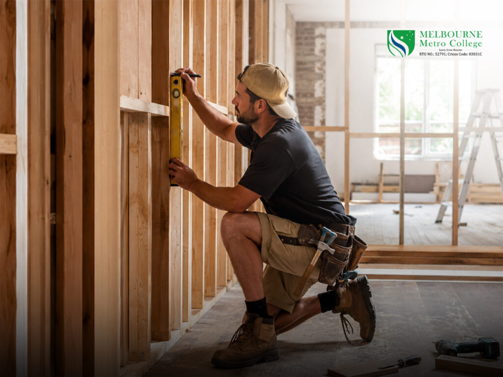 Skilled carpenter measuring timber wall framing during an Australian renovation project